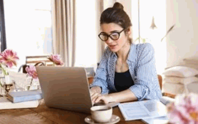 blogs/1660634632906-lady-working-from-home-with-laptop-and-coffee.png